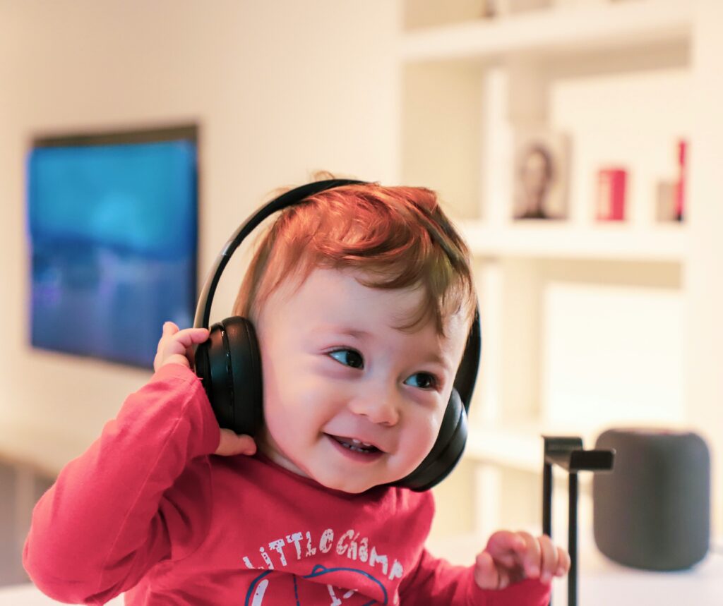 Cute kid wearing headphones